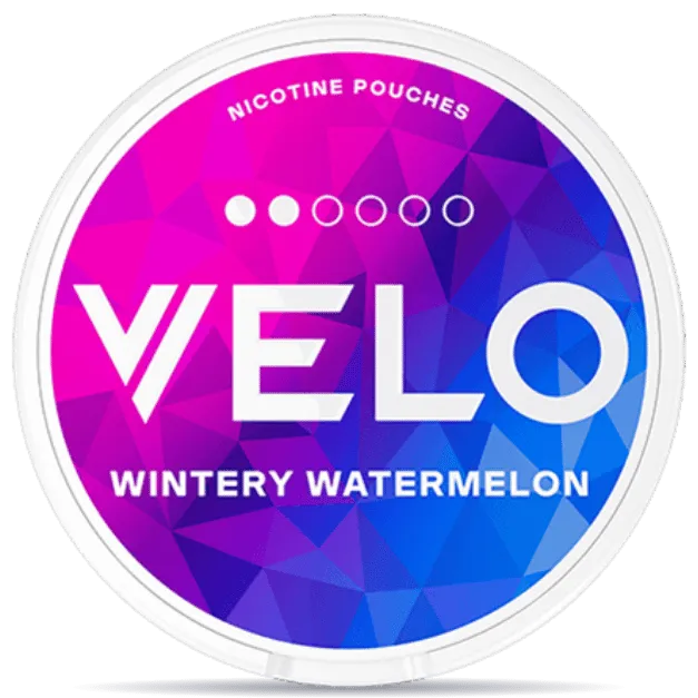 VELO Wintery Watermelon Mini nicotine pouches can with white rim, pink and blue geometric design, cool watermelon flavor, tobacco-free smokeless nicotine pouch packaging